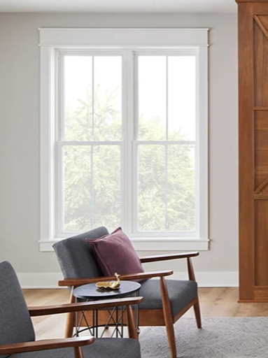 Encompass by Pella White Vinyl Double hung window in the living room.